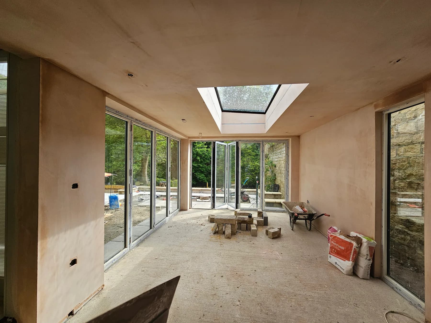 Rear extension with lantern rooflight plastered to a smooth finish