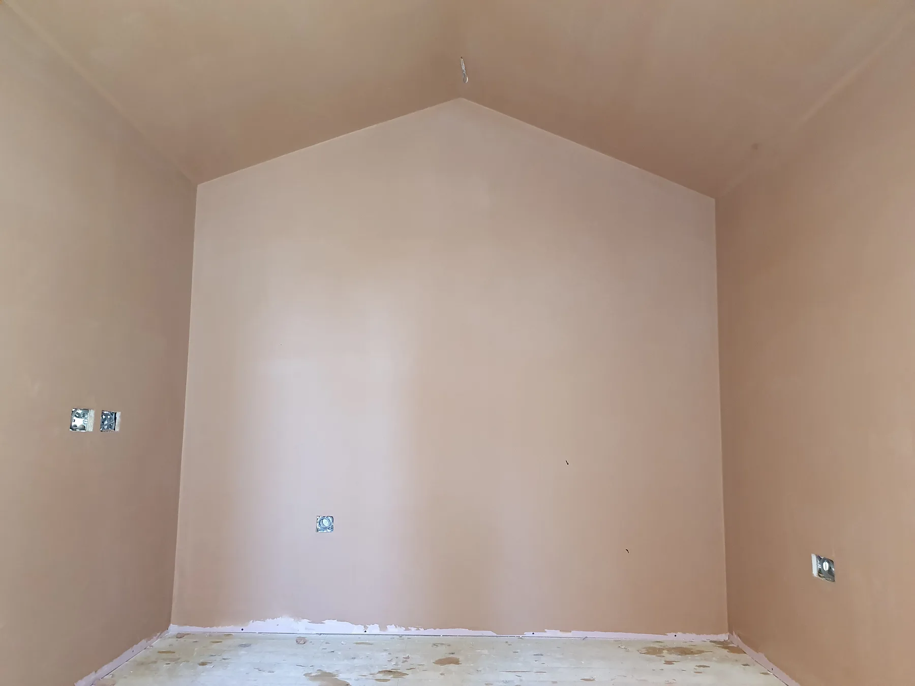 Vaulted bedroom corner plastered to a smooth finish