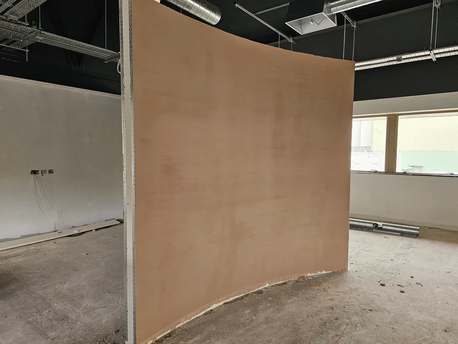 Large commercial open-plan partition wall and ceiling plaster